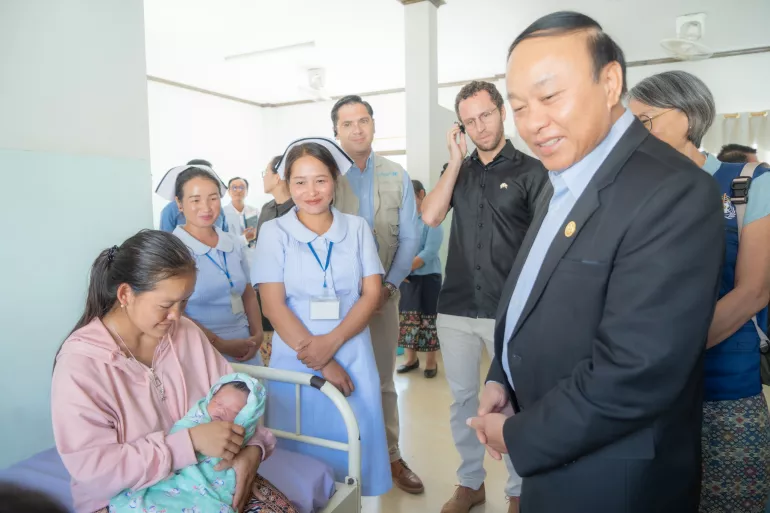 H.E. Dr. Bounfeng Phoummalaysith, Minister of Health of Lao PDR, leading a delegation comprising of representatives from UNICEF, UNFPA and WHO during a visit to a local health centre in Bokeo Province, Lao PDR. 