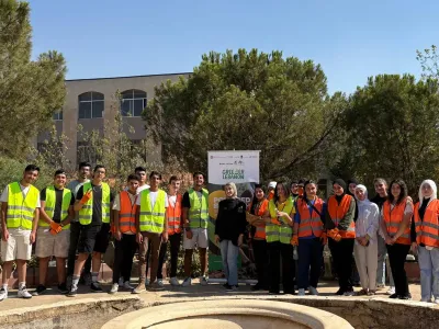 Youth posing for a picture after they finished cleaning 