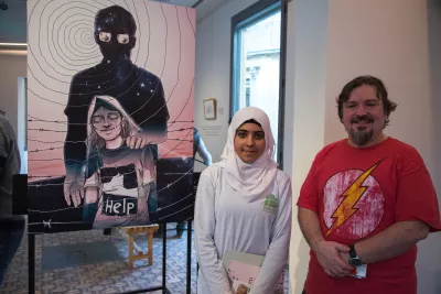 Syrian refuge girl with an artist 