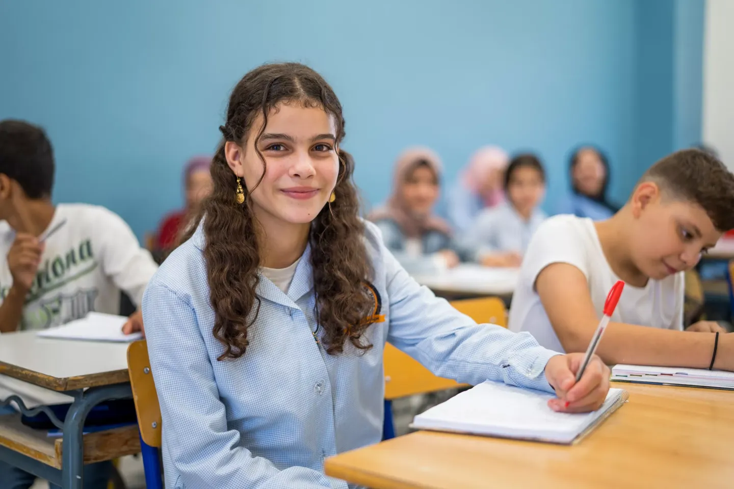 A young girl in the classroom 