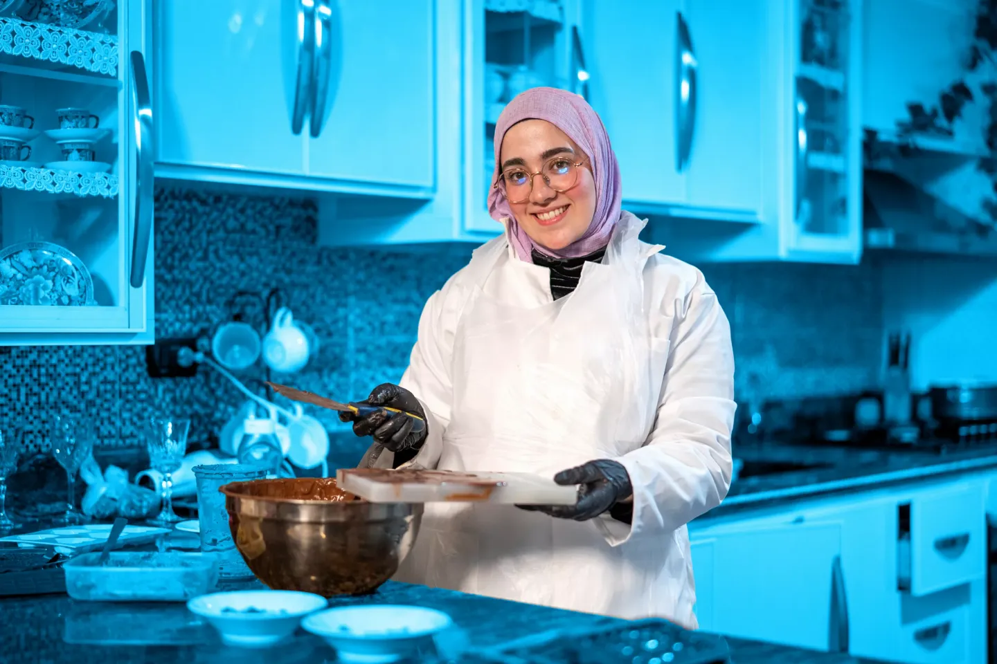 One of the youth participants baking
