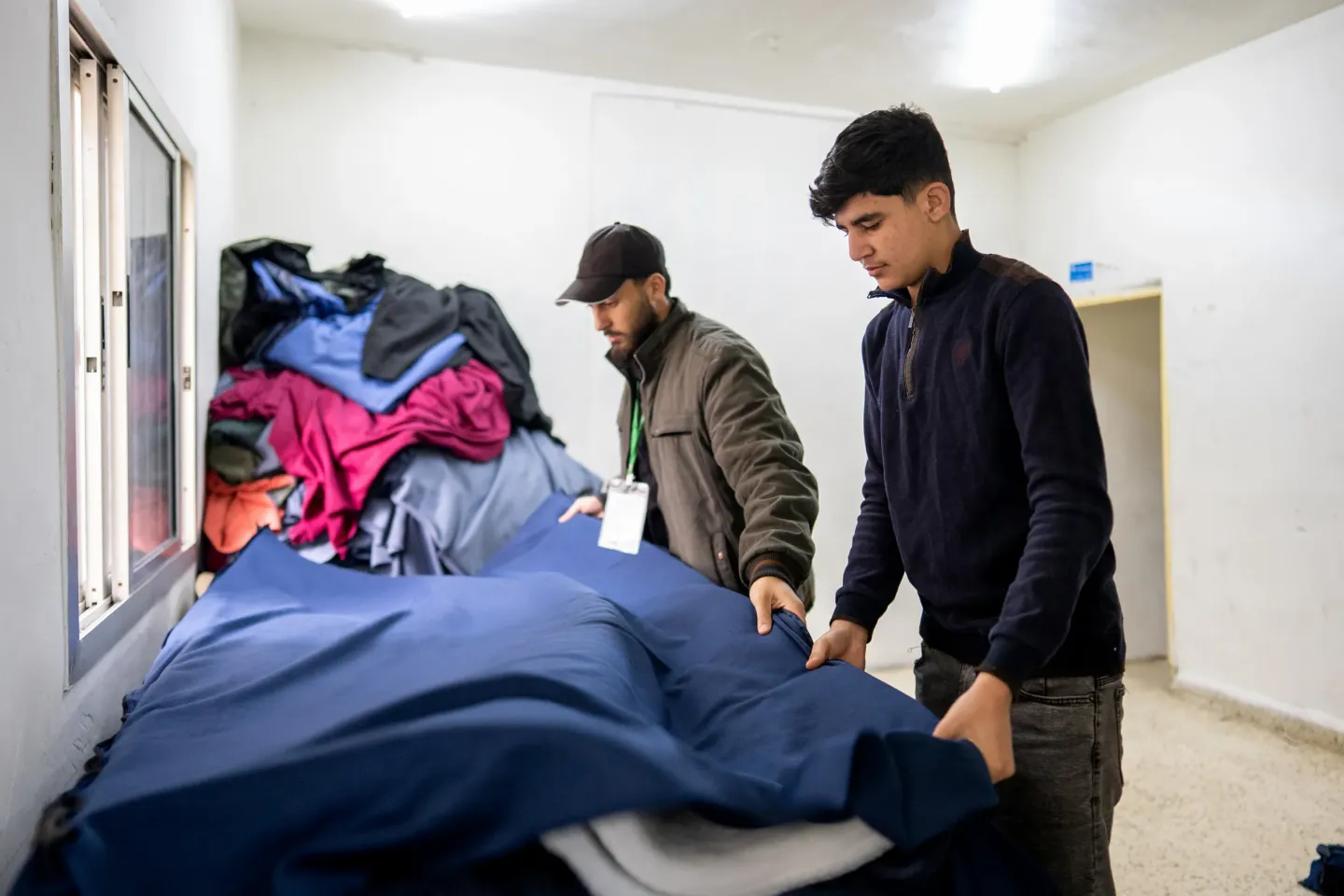 Houssein18 years old and Mesaab18 years old, checking the sheets they sewed