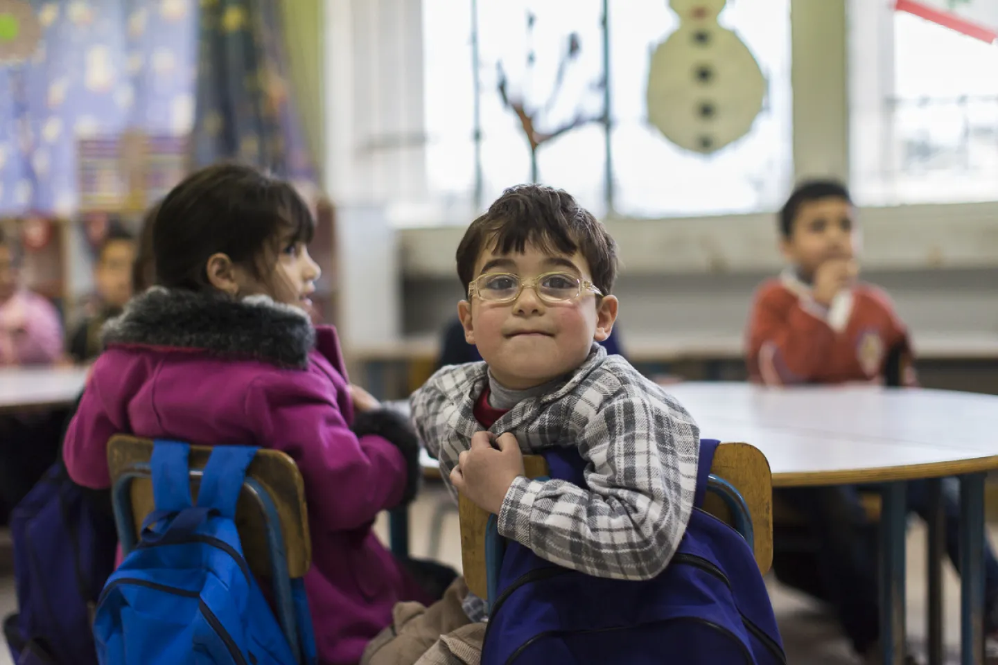 Happy boy in a school.
