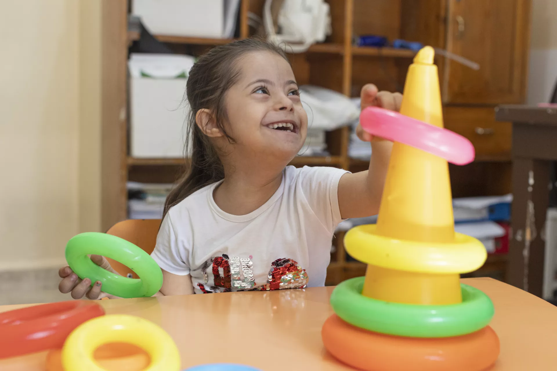 Mais, 5, attends courses at an educational centre run by UNICEF partner