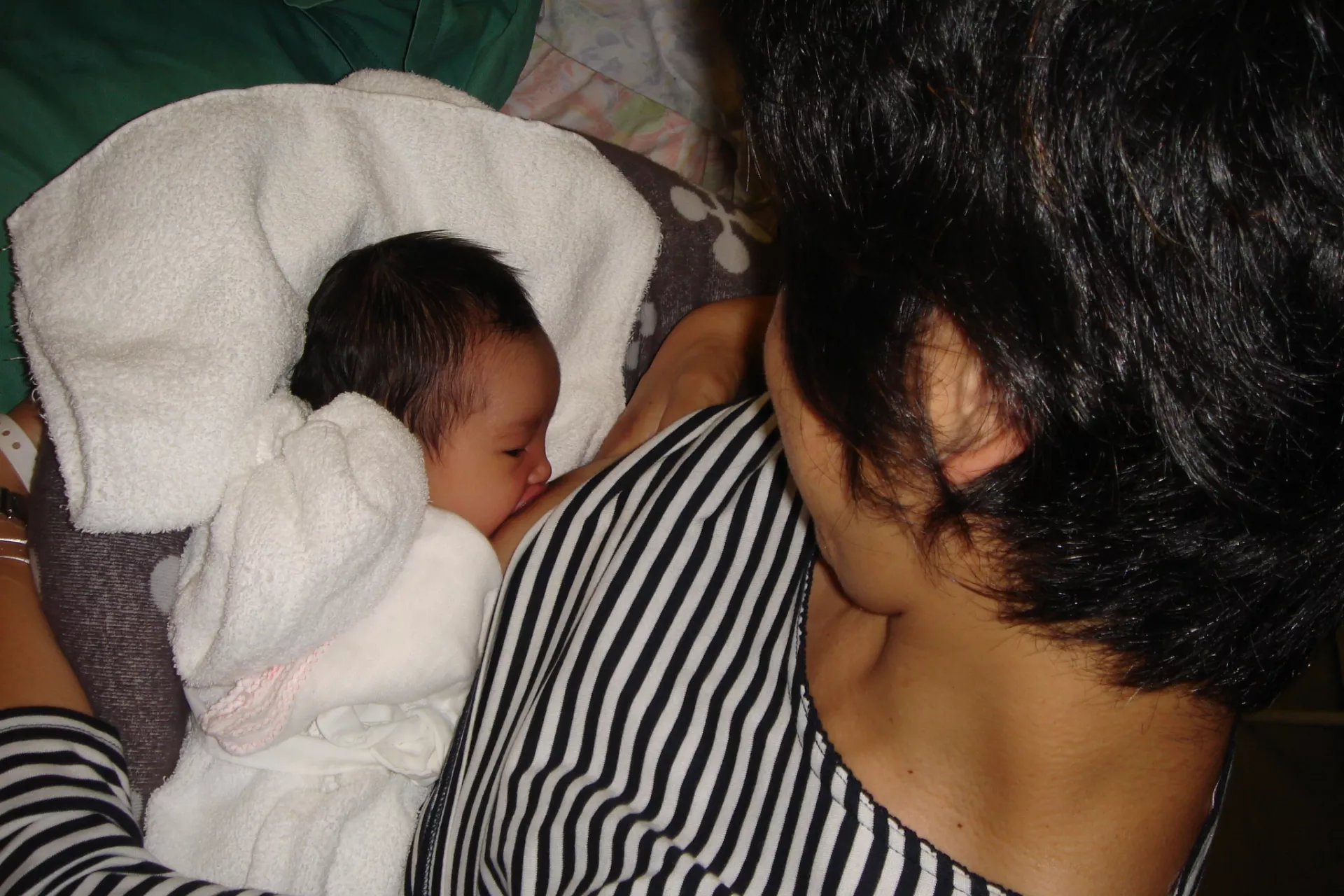 Yukie Mokou UNICEF Lebanon Representative breastfeeds her daughter Pari.