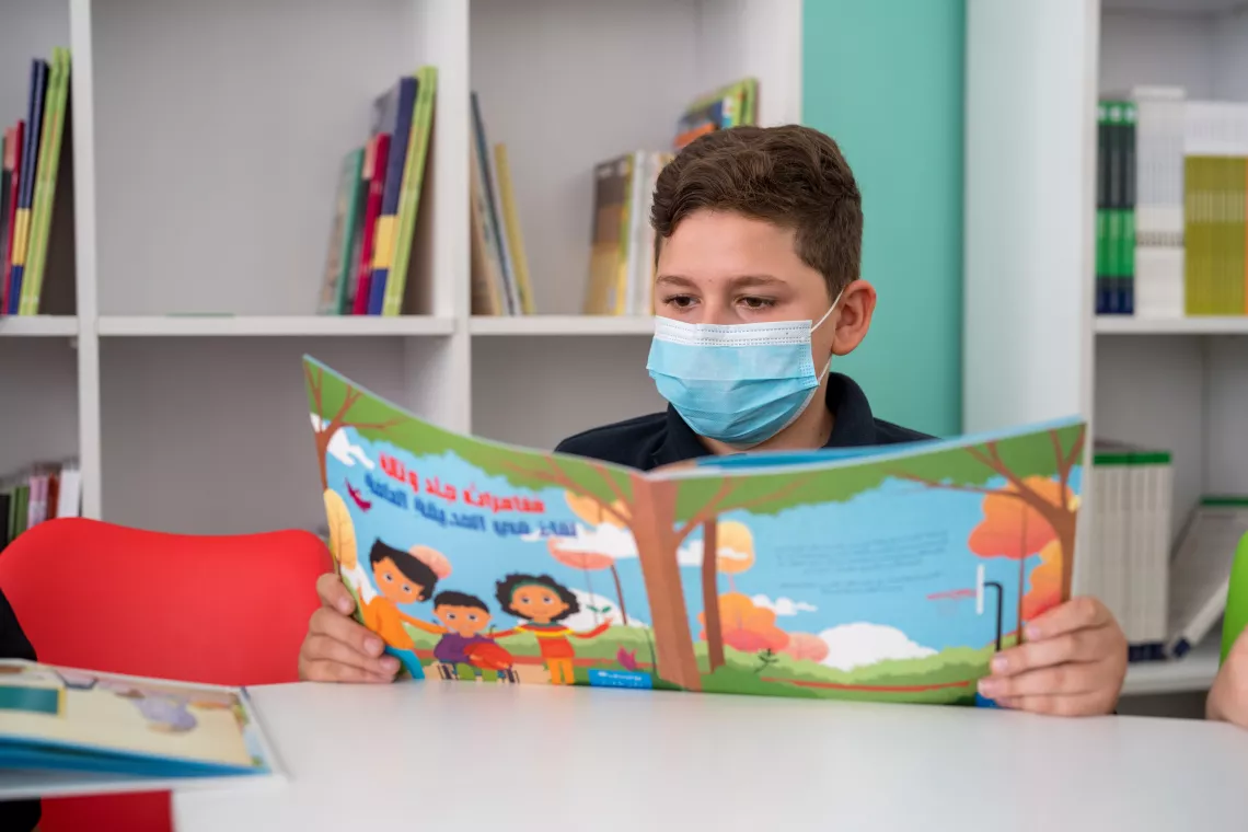 Child Reading jad and tala story 
