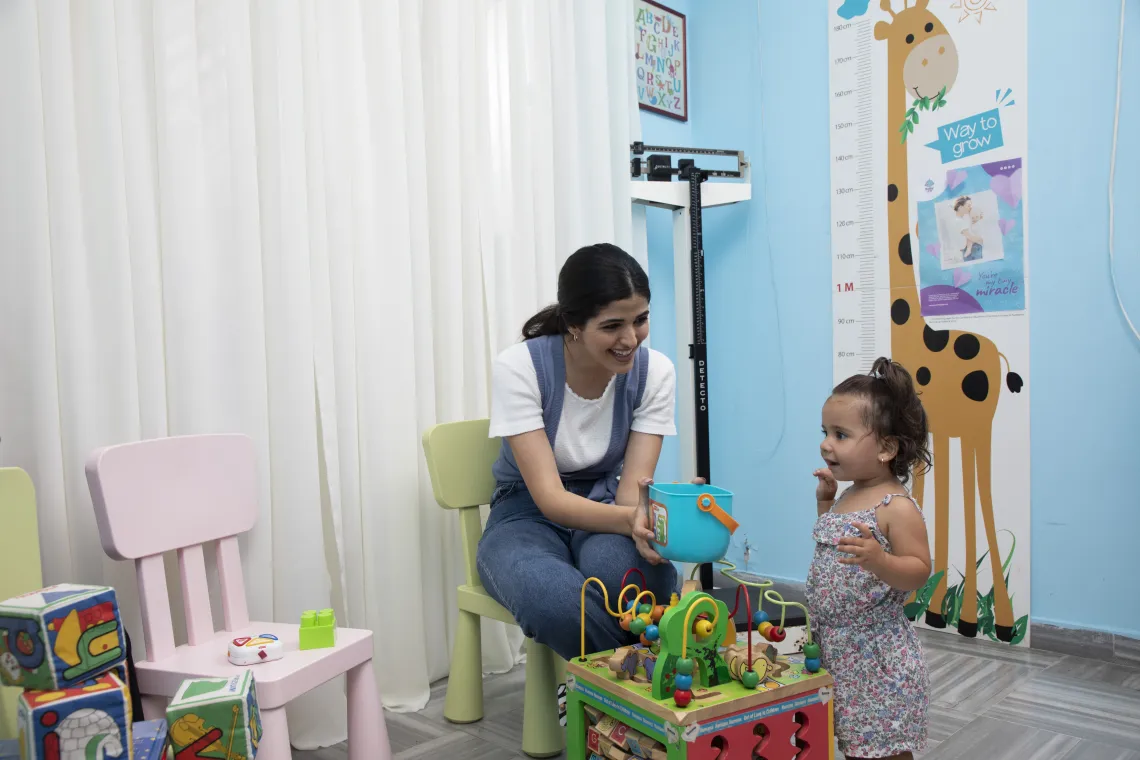 A mother and her daughter at the pediatrician 