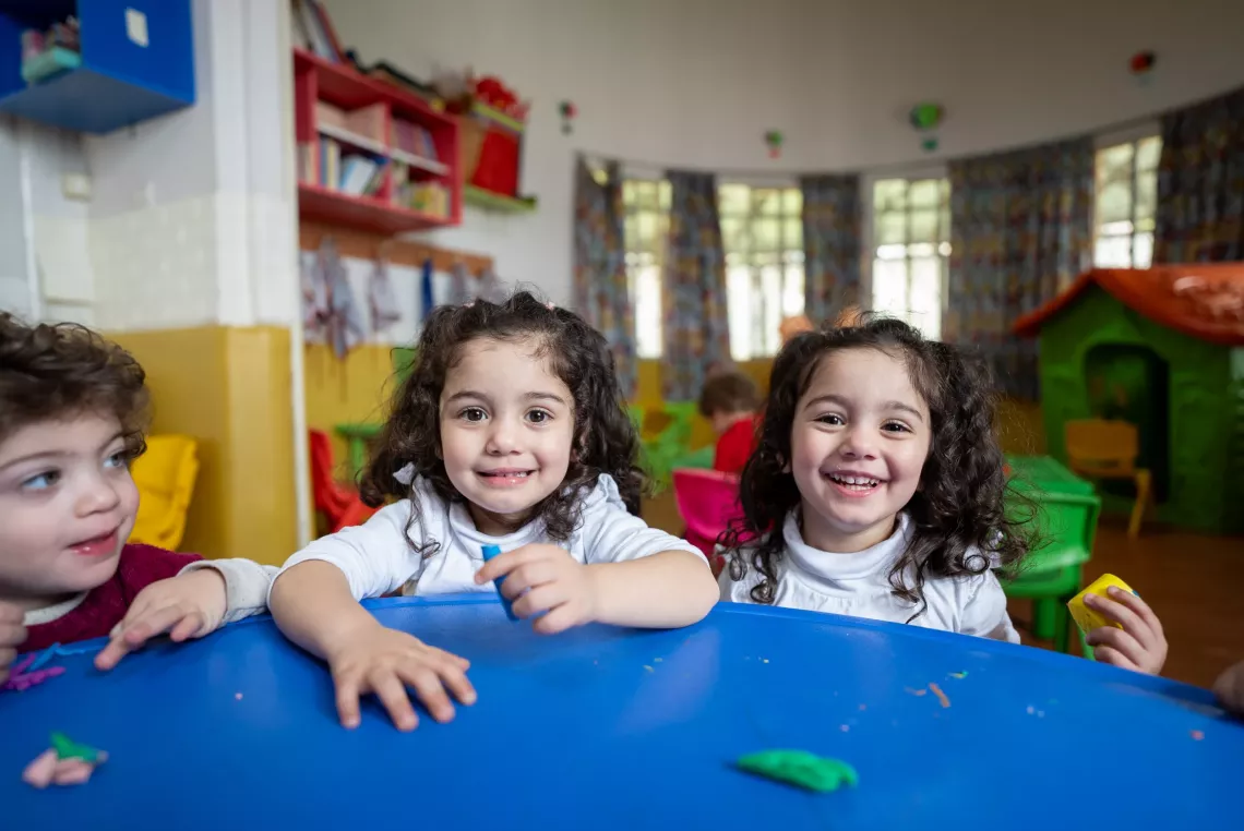 Clara and Chloe, 3 years old, in the classroom