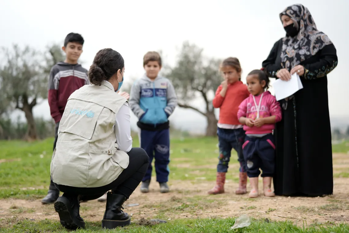 Outreach workers informing children on how to reach life-saving vaccination programmes.