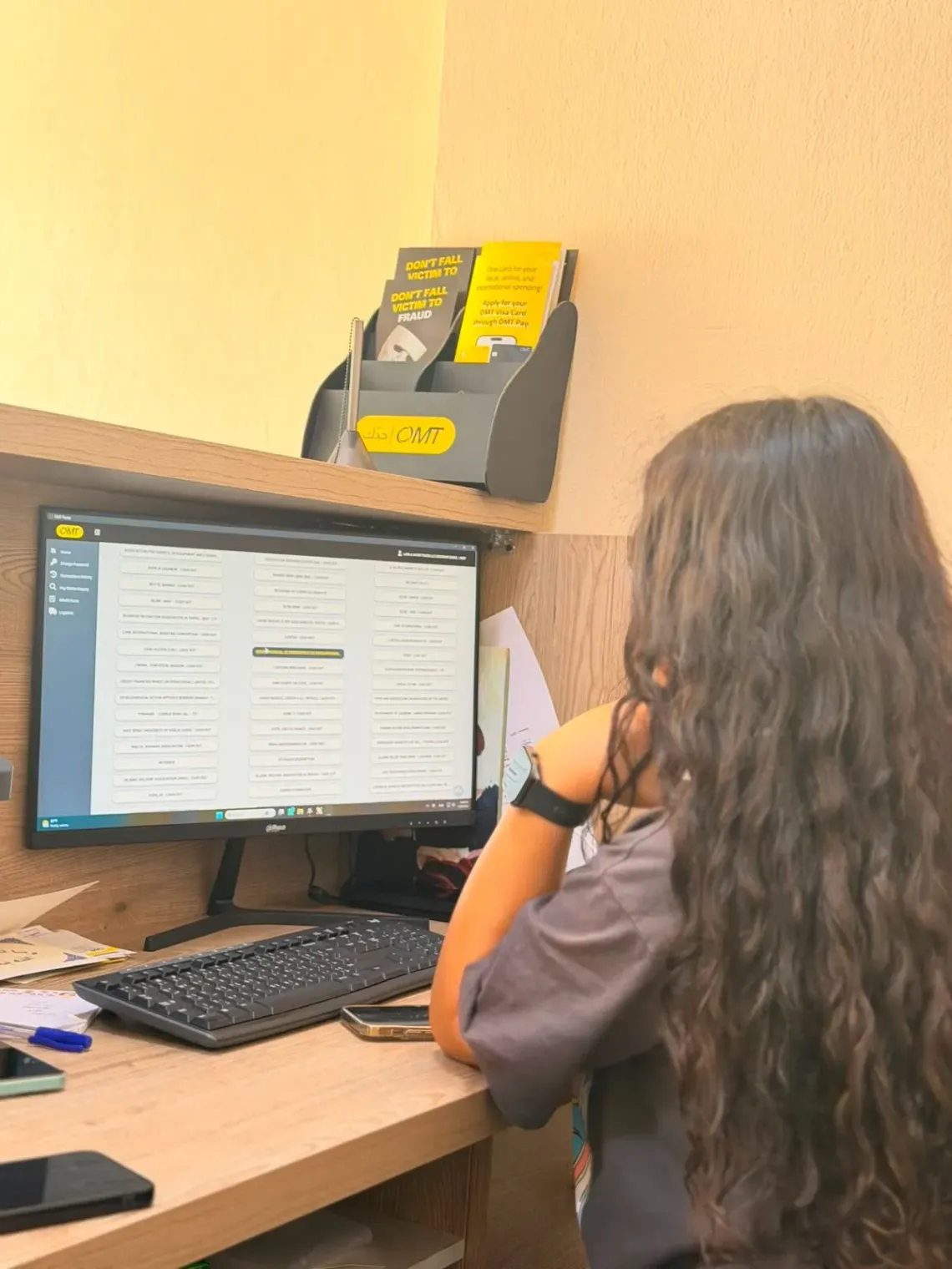 May looking at the computer screen