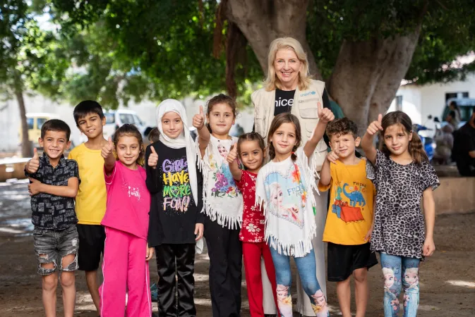 UNICEF Executive Director Catherine Russell interacts with children during a visit to a collective shelter hosting displaced families in Tyre, southern Lebanon.