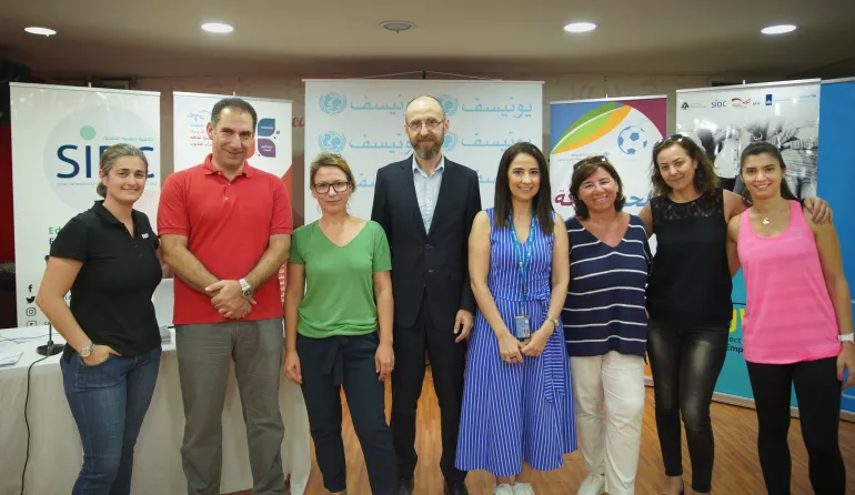 Representatives on behalf of the Ministry of Health, SIDC and UNICEF standing for a picture