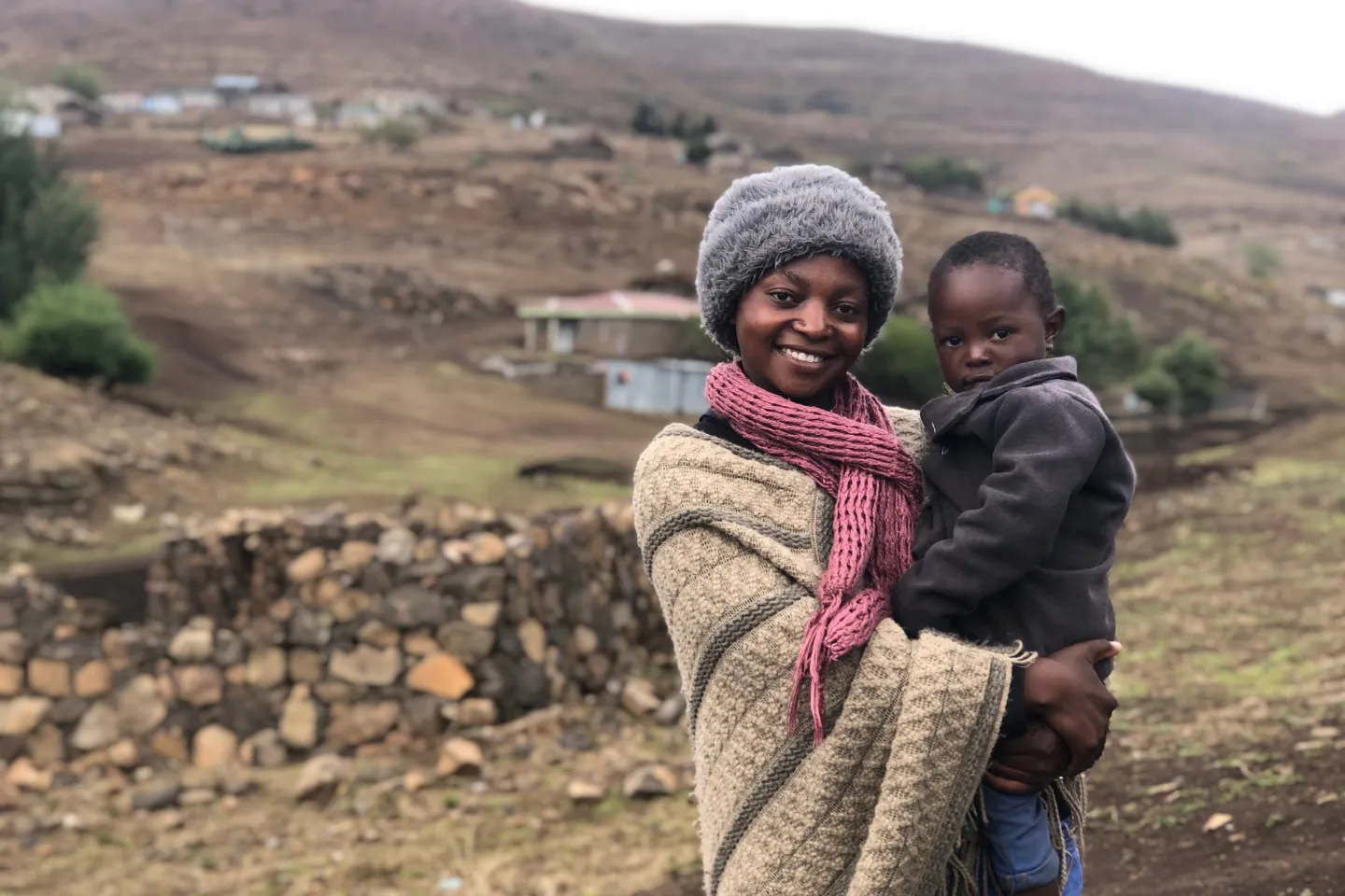 Mother holding young child