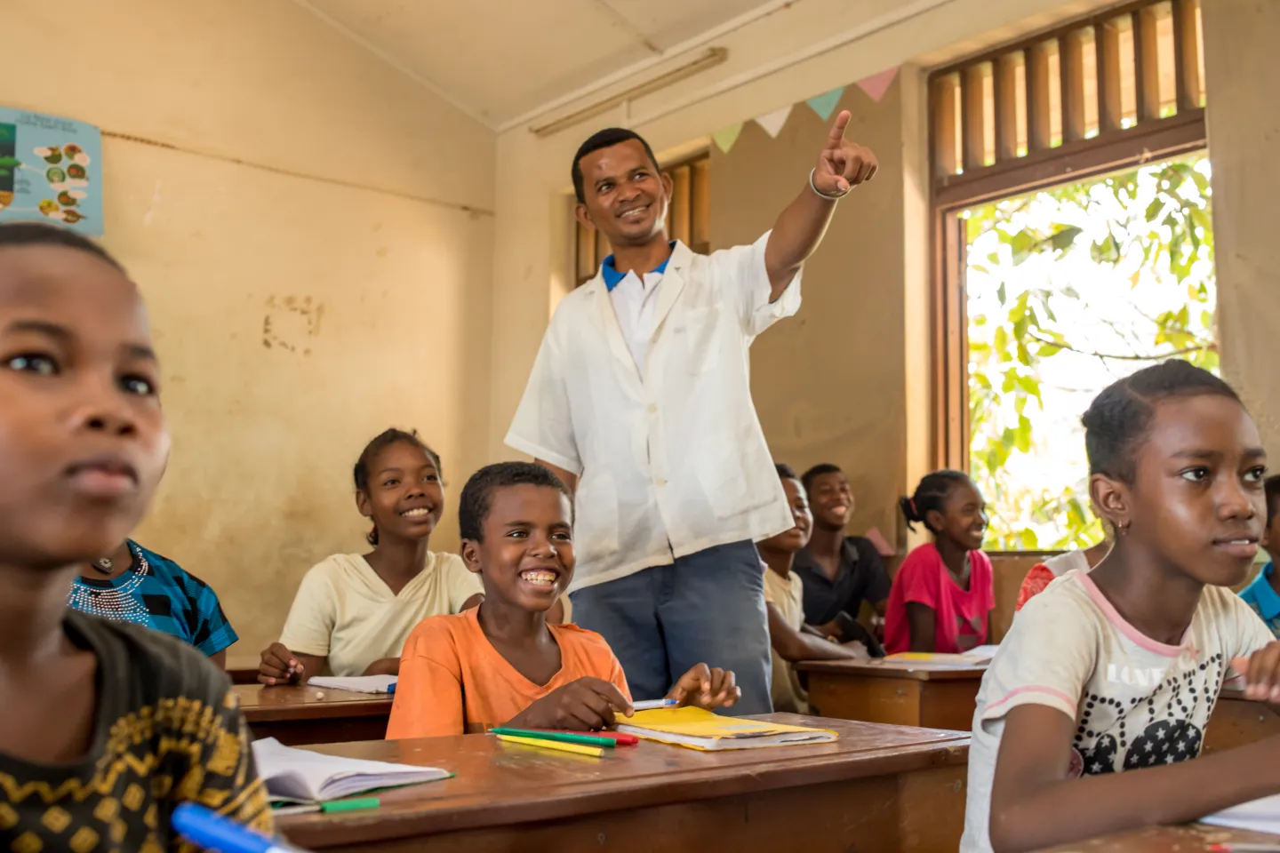 Many children affected by the flooding lost their precious school supplies. With replacements supplied by UNICEF Dolys and others have returned to school