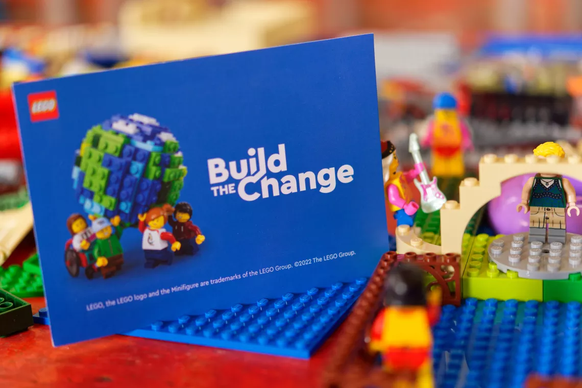 A flyer for the LEGO Build the Change project among the designs shared by the children. 
