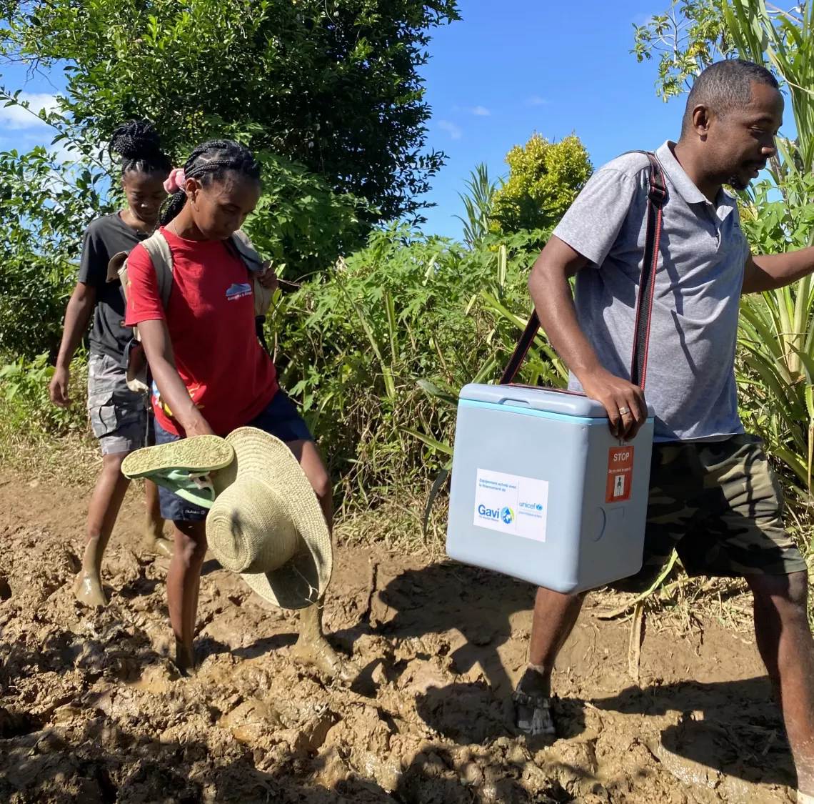 An hour later, the team is still trudging  through mud. 