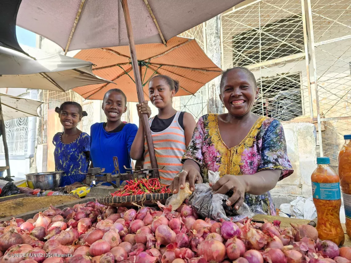 When they have free time, the girls help their mother at the vegetable market