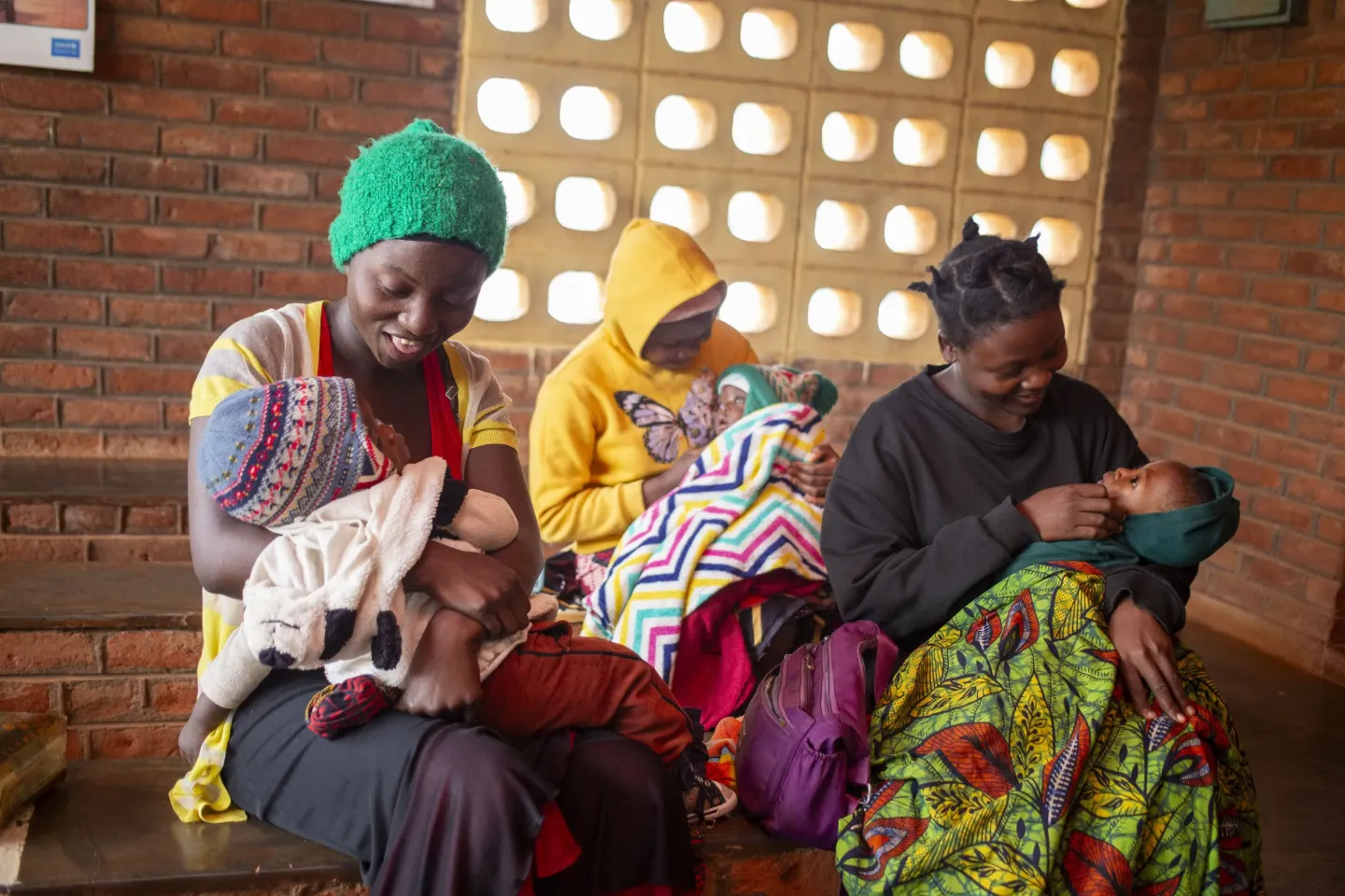 Pemphero Makina (R) holds her daughter Alinafe at St. Vincent Hospital in Blantyre District, Malawi