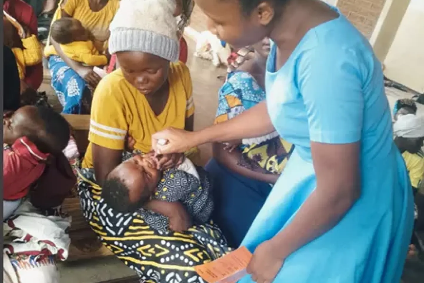 Sauda getting her very first dose of polio vaccine at the Namandage Mission Hospital in Machinga District 