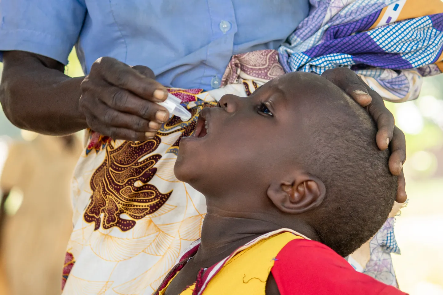 A child recieving the oral cholera vaccine in Chikwawa district