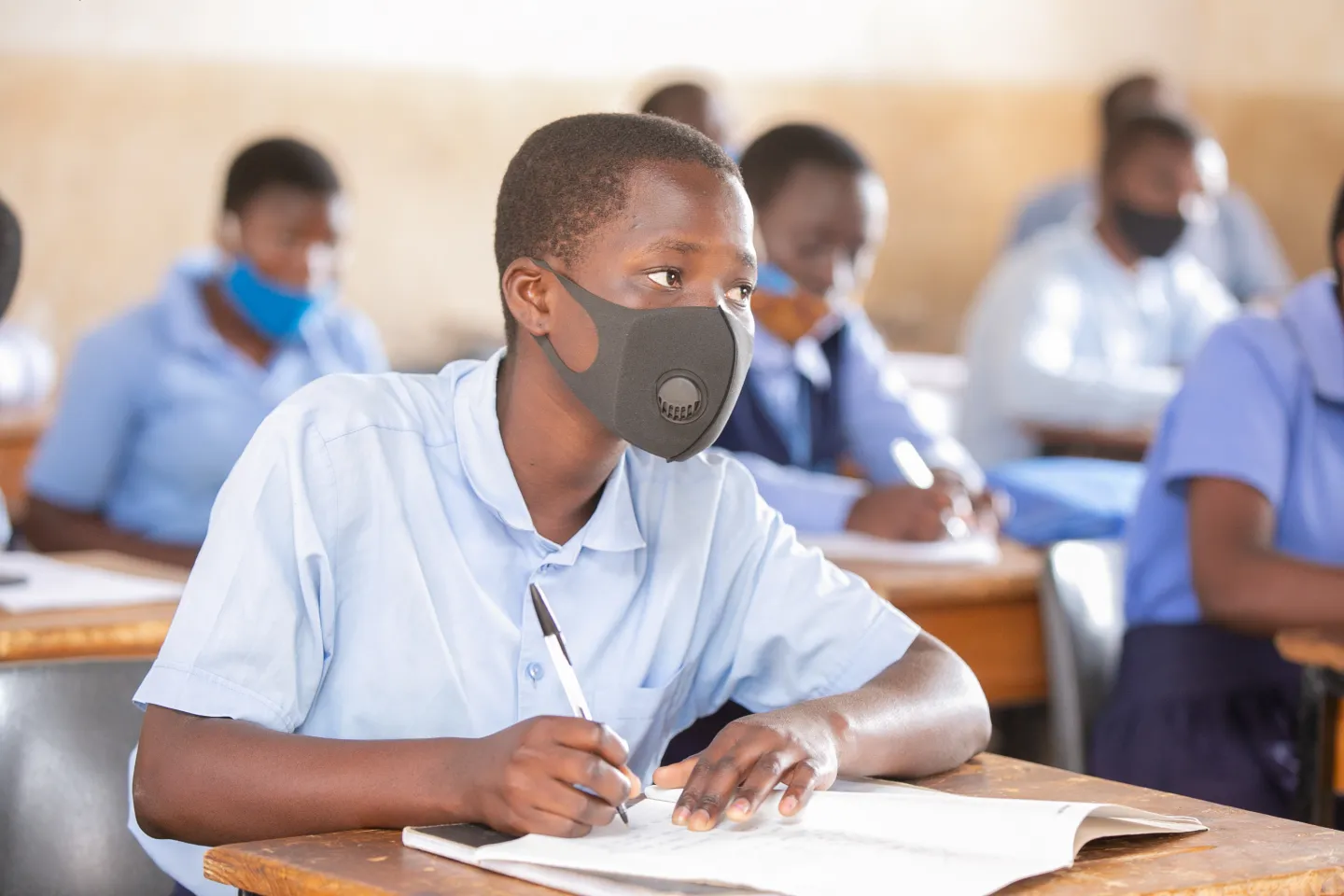 Nelia Phiri, focused in class at Mpamba Community Day Secondary School