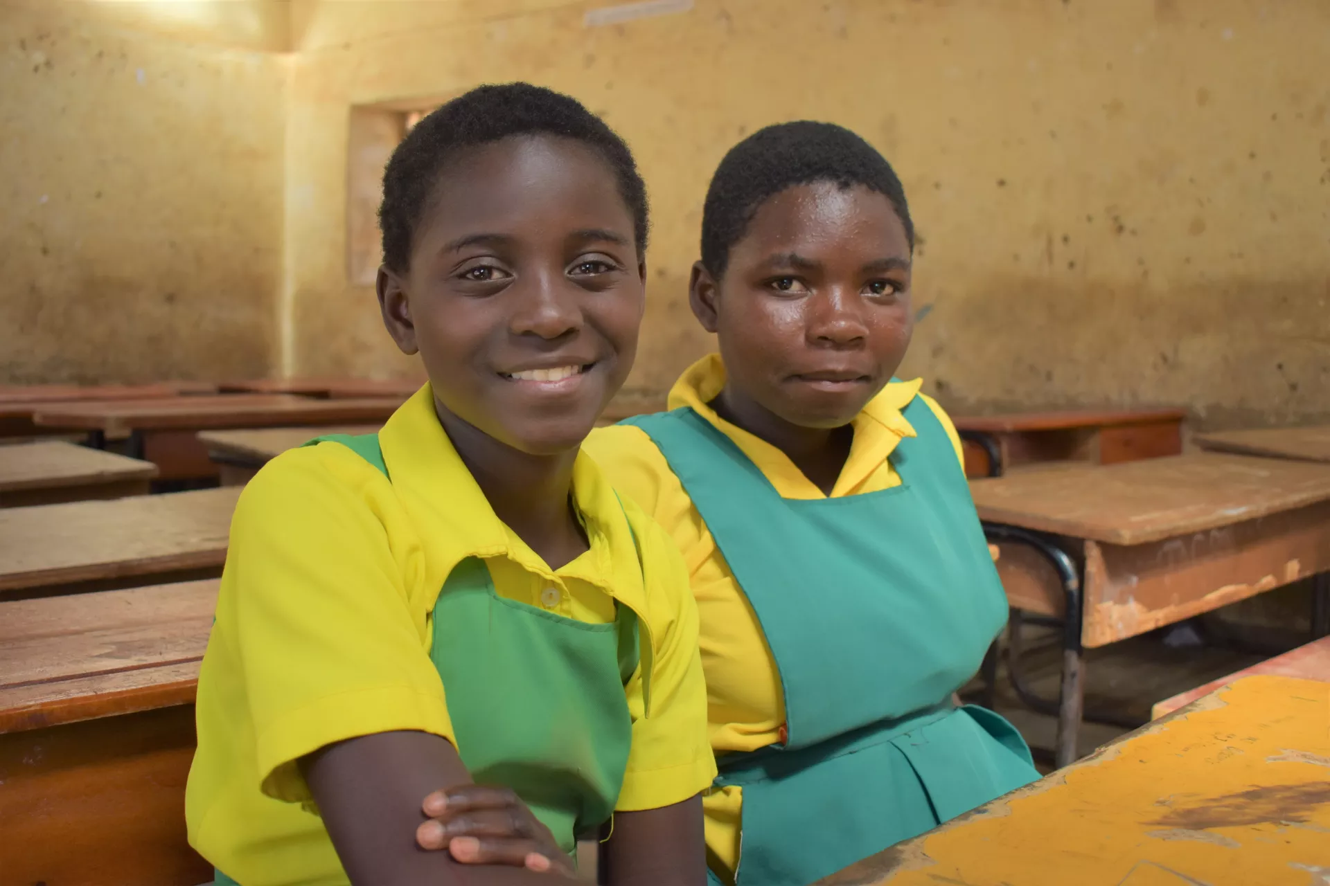 Alefa in class with her best friend 
