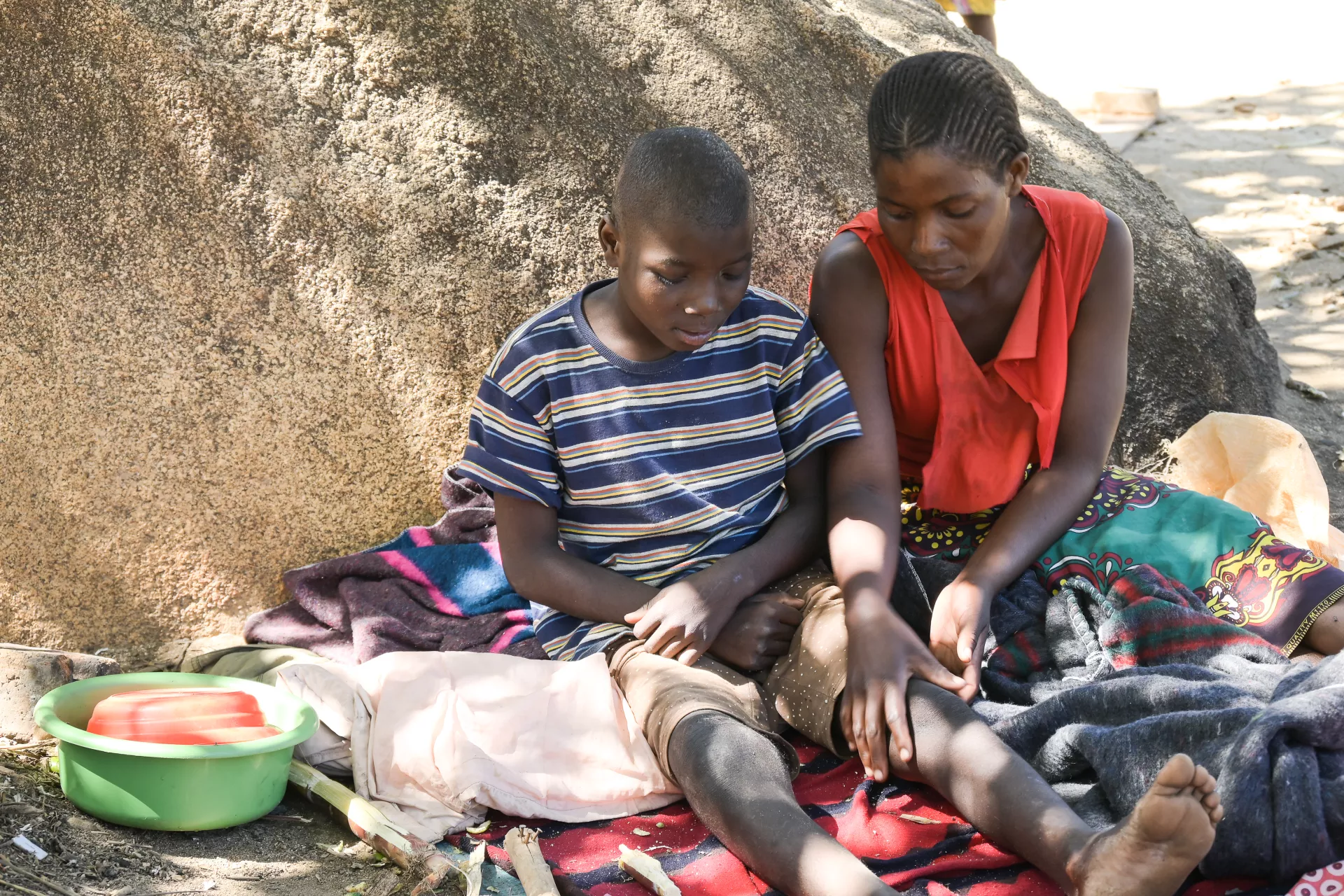 28-year-old Asiya Ngalanda and her 12-year-old son Gift Yuwa who sustained a fracture during Tropical Cyclone Freddy at Nkhulambe Camp in Phalombe
