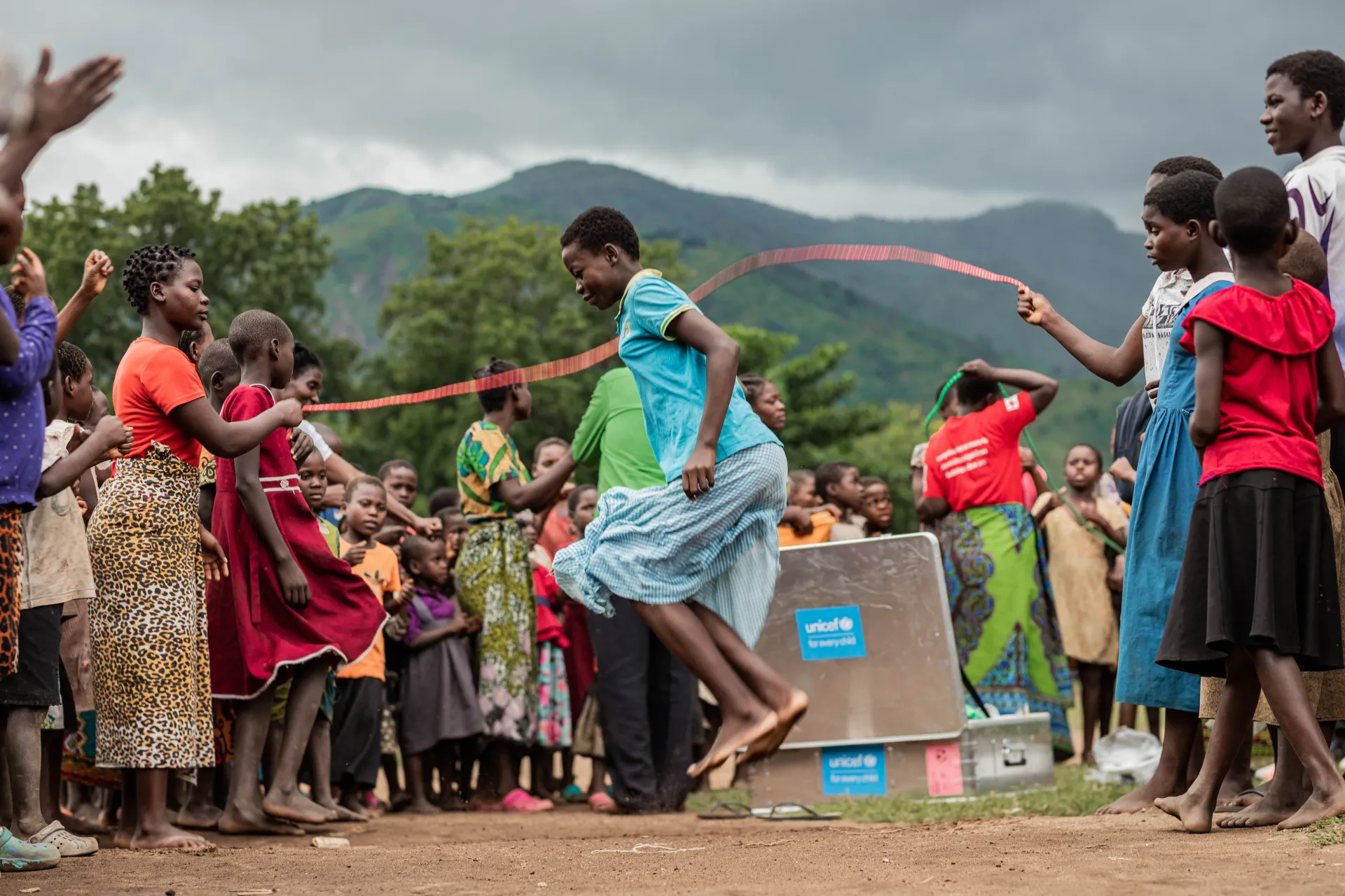 A displaced child playing at a children's corner in Chikwawa with play materials provided by UNICEF