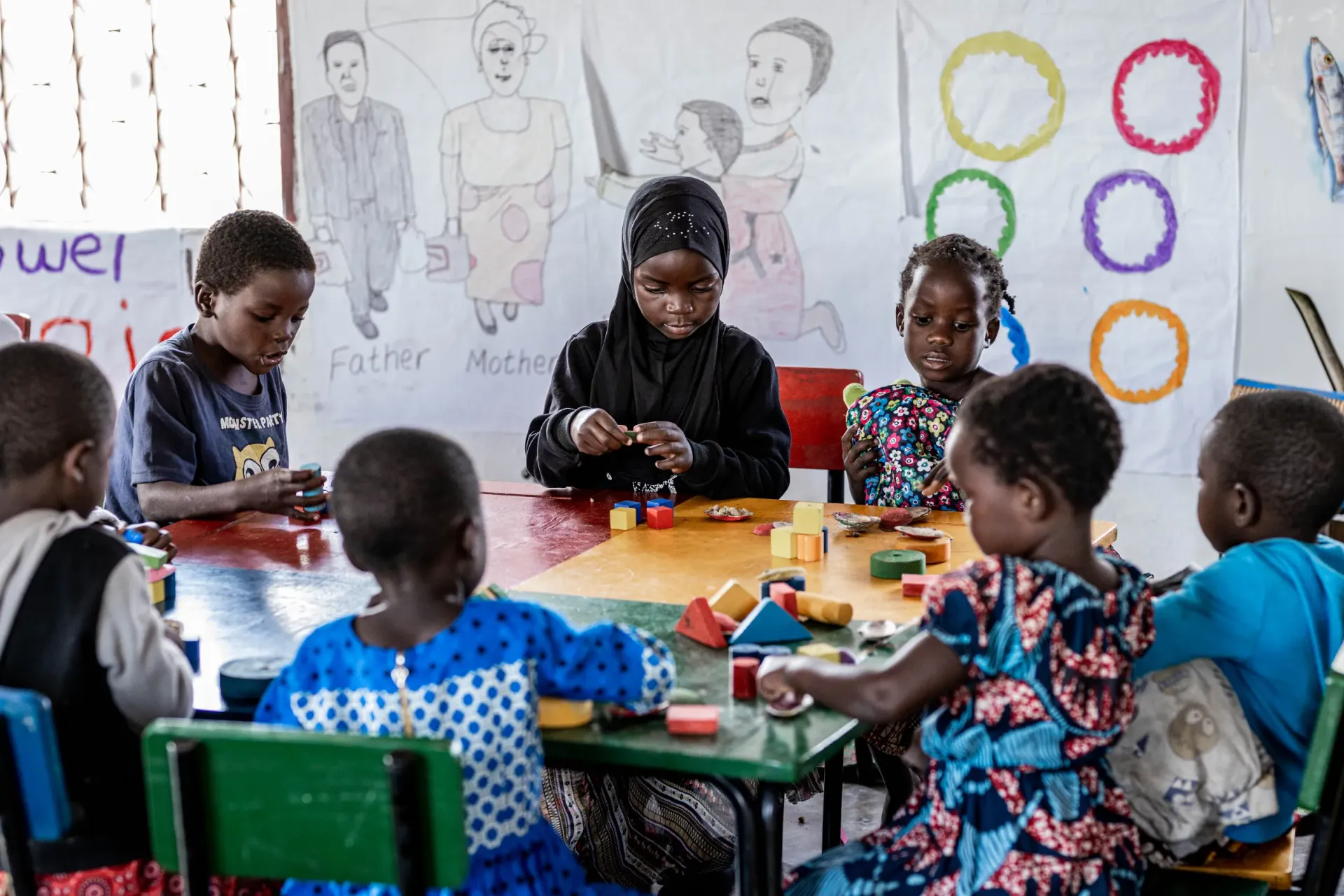 Children play with building blocks during P-Class at Chidoola Primary School in Salima District.