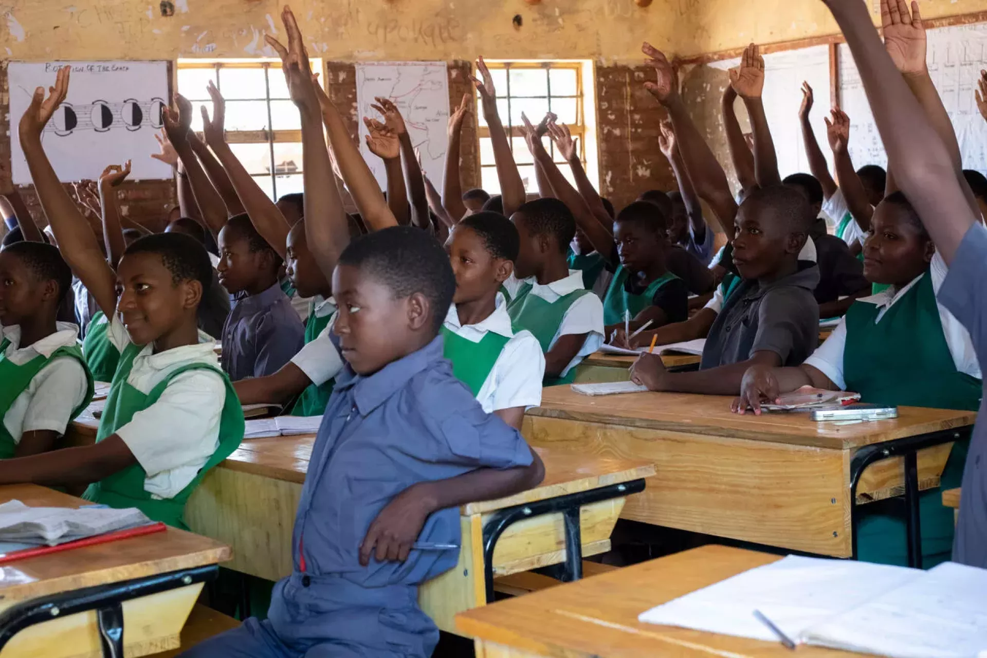 Learners at Mwenyekondo Local Education Authority School delighted to sit on their new desks 