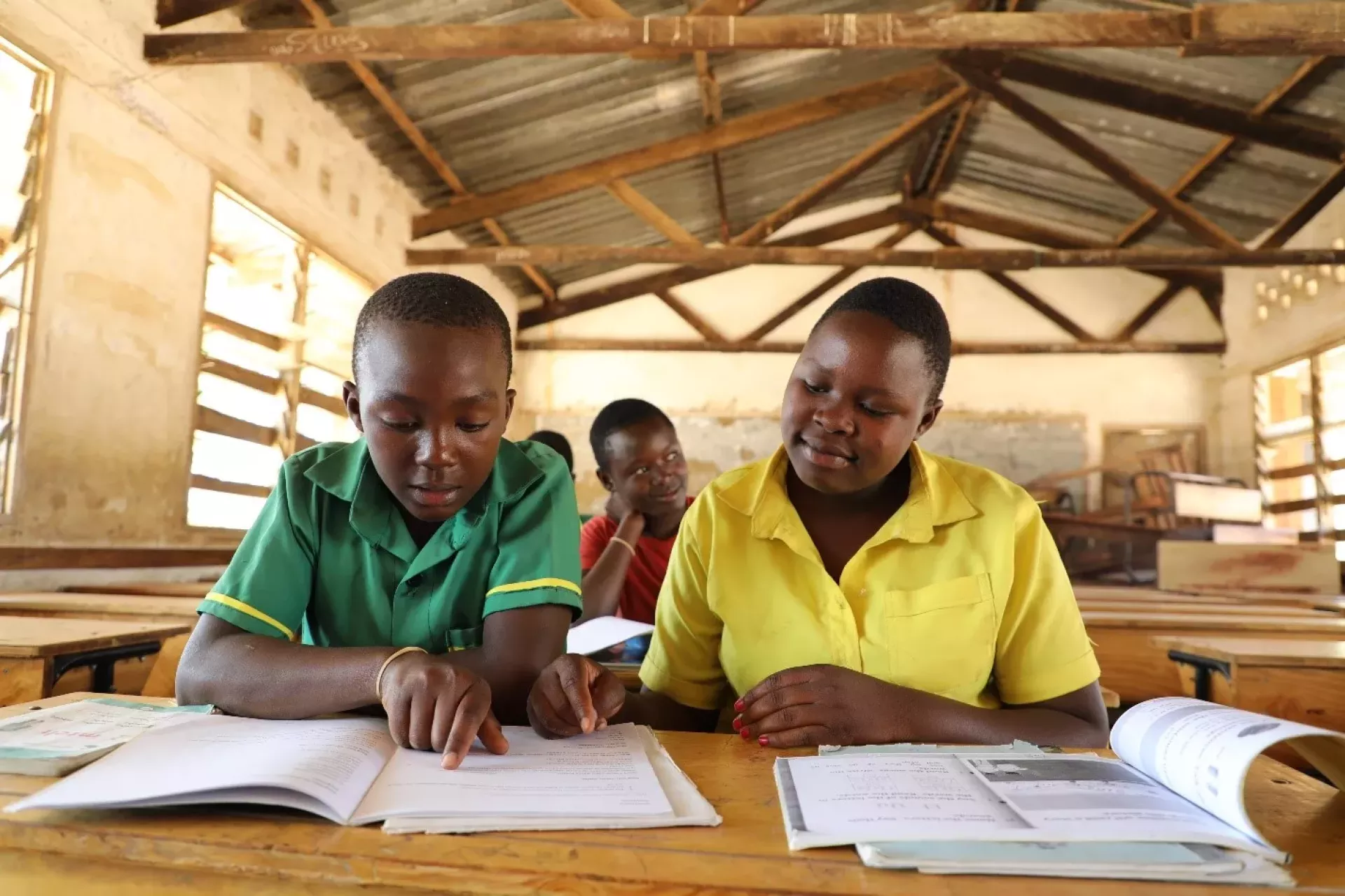 Dumisani (left) and Callista (right), feels safe at school and are now determined to achieve their career goals after receiving the COVID-19 Vaccine. Photo: &copy; UNICEF/Given Chichitike/2024 