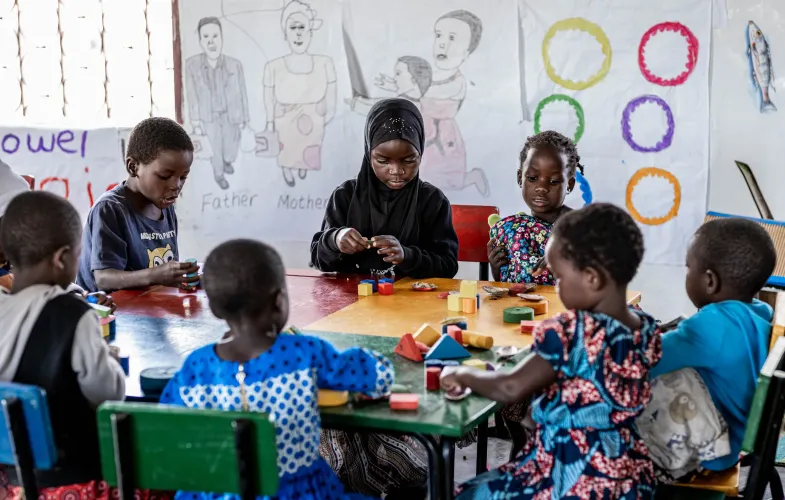 Children play with building blocks during P-Class at Chidoola Primary School in Salima District.
