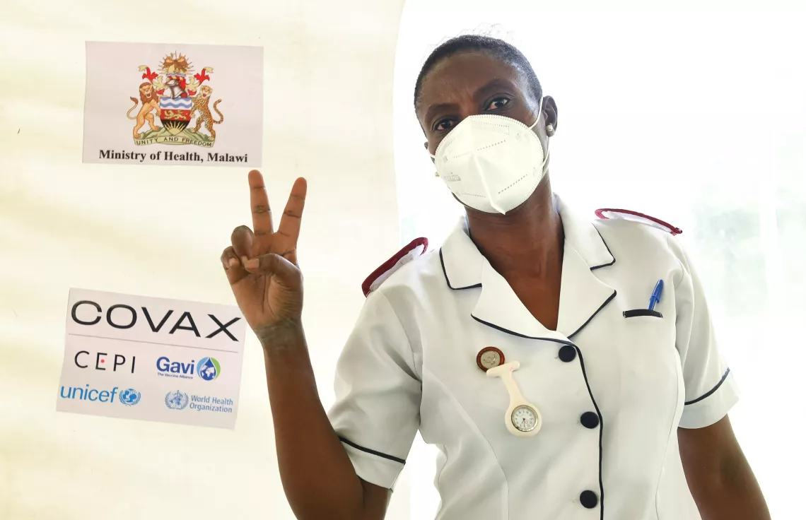 Hope on the frontline as nurse Helen and others get the COVID-19 vaccine on day one of the rollout in Malawi