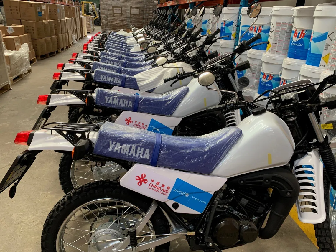 Motorcycles procured through China Aid support, at the warehouse before distribution