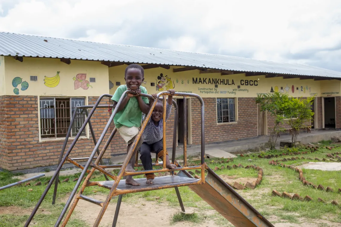 Pre-school children playing at Mankhamba CBCC, a facility that has been supported with sanitation facilities by UNICEF.