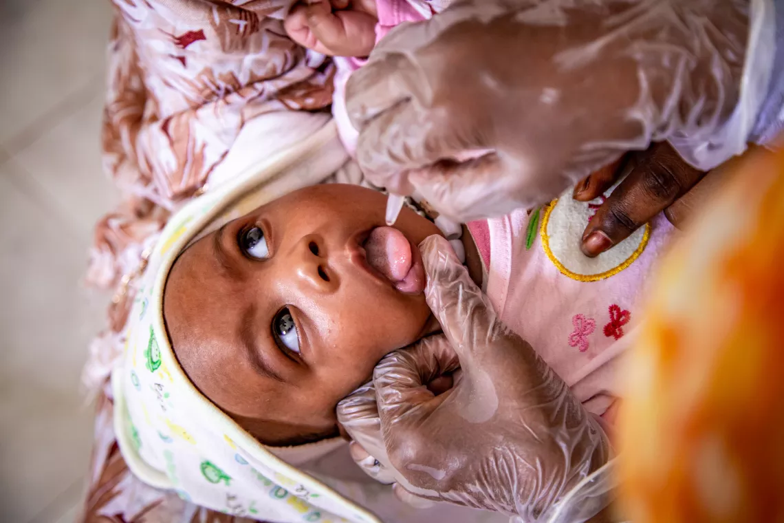 A child taking a vaccine