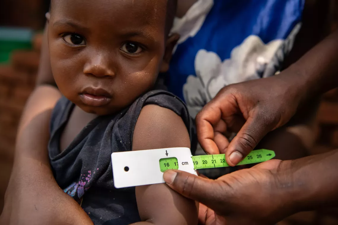 19 months old Marvelous Austin is on green after been screened for malnutrition using MUAC
