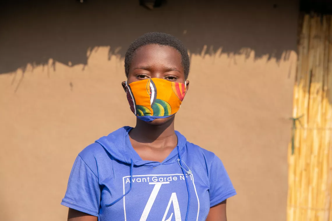 Amina wearing her tailored mask. Since schools reopened in October it has become a requirement for every learner to wear a mask 