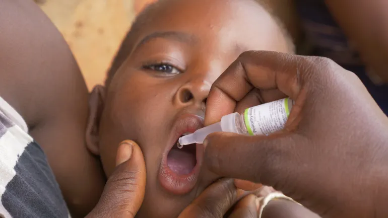 A child receiving the polio vaccine in Balaka