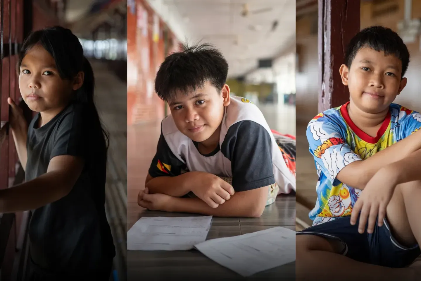 Three children from Sarawak pictured indoors. A girl stands by a wooden doorway, a boy leans over schoolwork on a table, and another boy sits with his arms resting on his knees.
