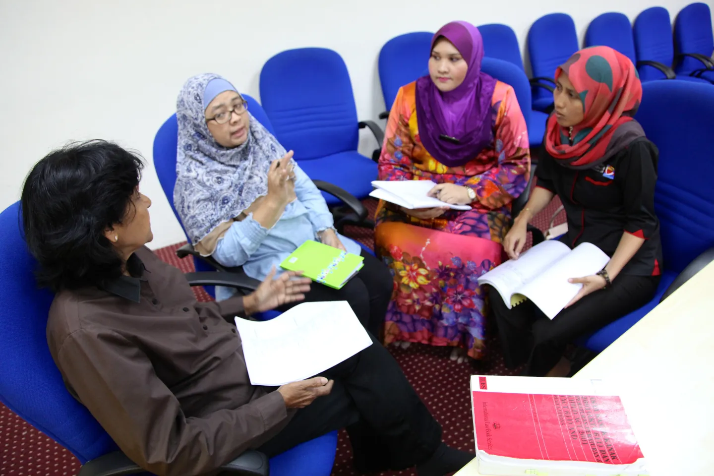 Social workers discussing issues