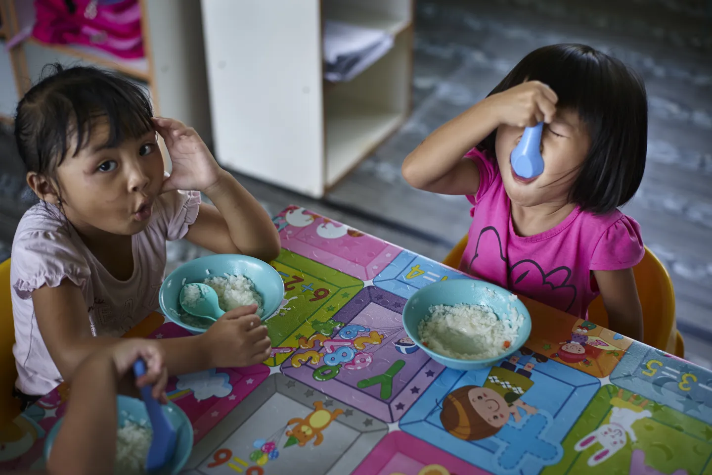 Two children eating