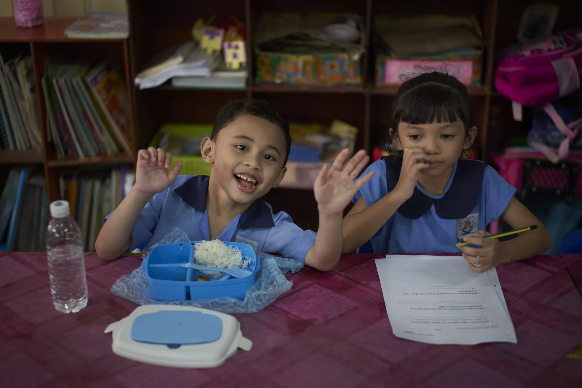 malaysian children eating, learning