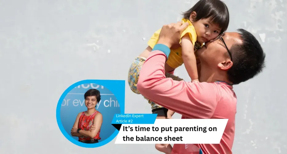 Father carries child with inset photo of staff writer