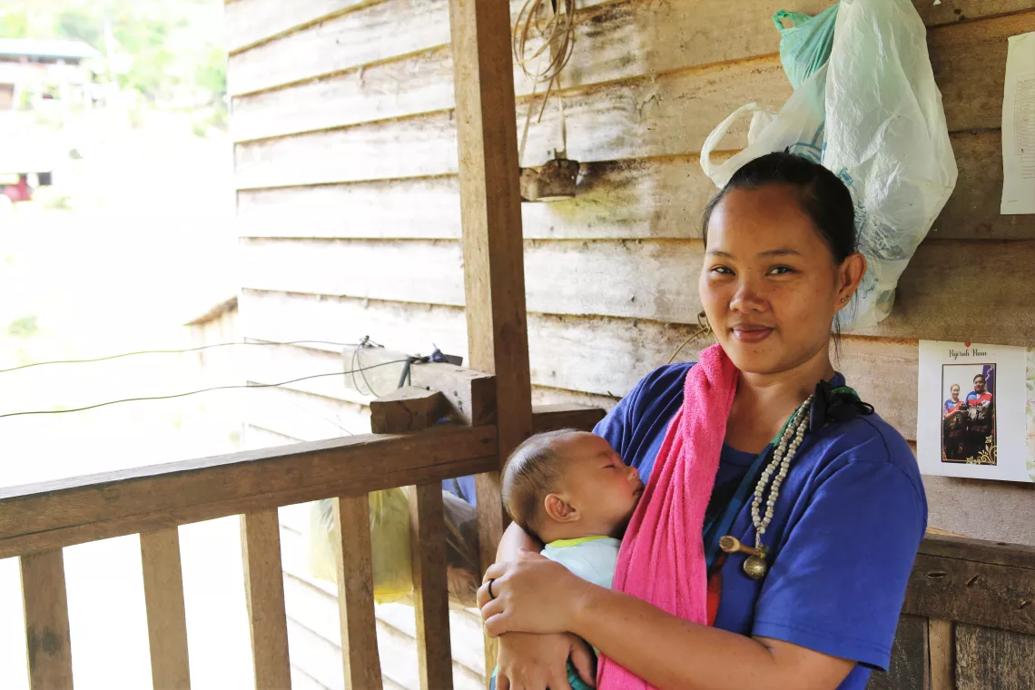A mother and baby waiting to see doctor