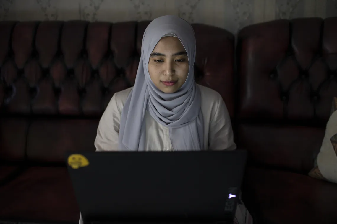 Young woman works as a fact checker