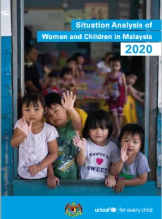 Four children waving