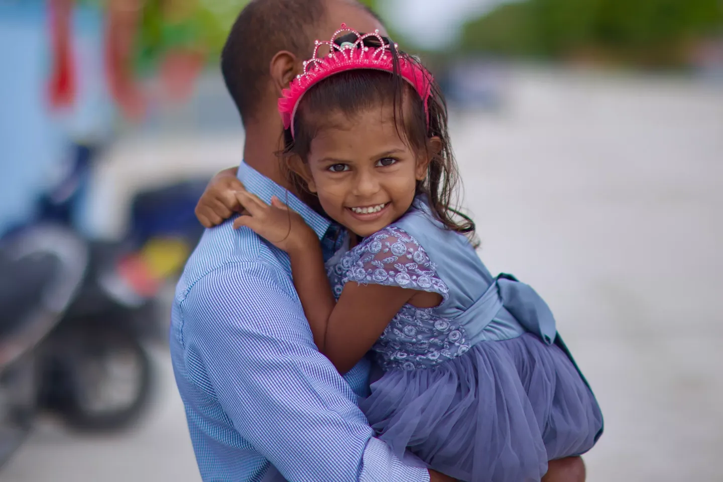  A young girl looking at the camera and smiling
