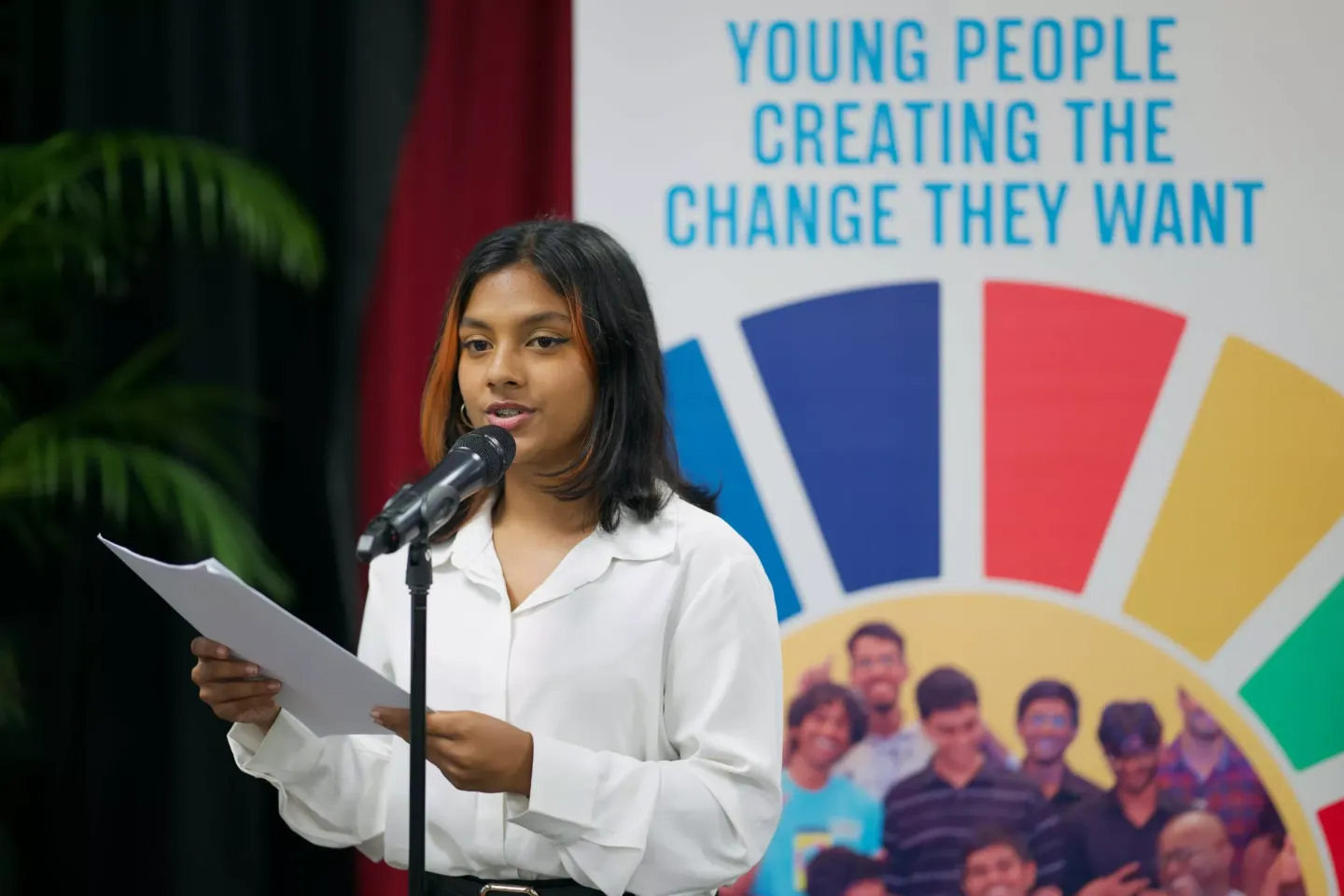 A young person giving a speech