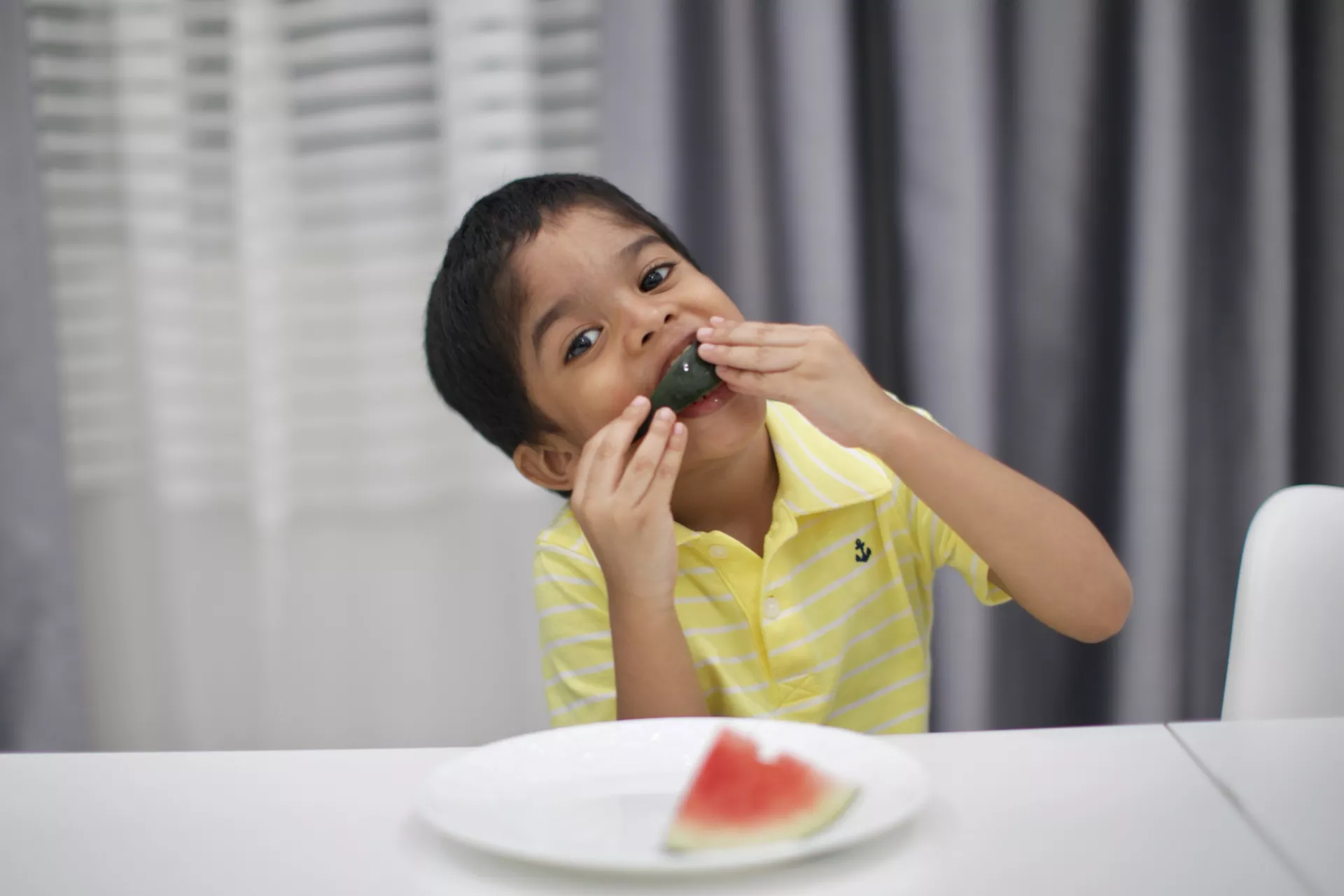 Child eating watermelon